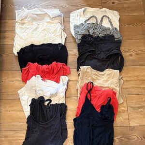 Assorted Lululemon Tops in Black, White, and Red